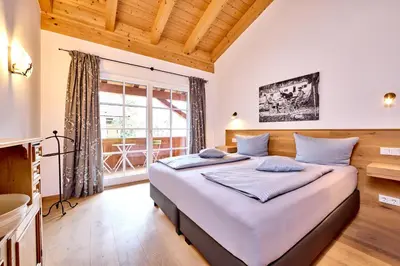 Ein Bett oder Betten in einem Zimmer der Unterkunft Ferienwohnung Eckbauer