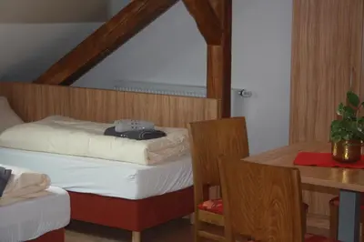 Ein Bett oder Betten in einem Zimmer der Unterkunft Pension Dorfstraße 6