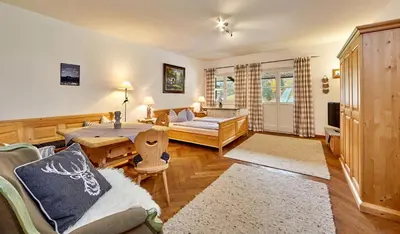Ein Bett oder Betten in einem Zimmer der Unterkunft Olympiahaus