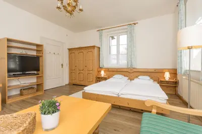 Ein Bett oder Betten in einem Zimmer der Unterkunft Villa Waldfrieden - Ferienwohnungen und -Haus