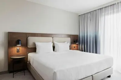Ein Bett oder Betten in einem Zimmer der Unterkunft Courtyard by Marriott Munich City East