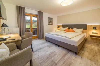 Ein Bett oder Betten in einem Zimmer der Unterkunft Gästehaus Linsinger