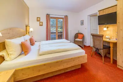 Ein Bett oder Betten in einem Zimmer der Unterkunft Gästehaus Linsinger