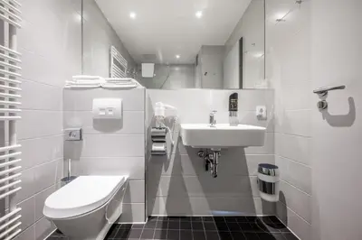 Ein Badezimmer in der Unterkunft Coffee Fellows Hotel Irschenberg Süd