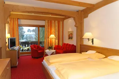 Ein Bett oder Betten in einem Zimmer der Unterkunft Kurhotel Eichinger