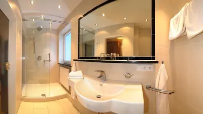 Ein Badezimmer in der Unterkunft Kurhotel Eichinger