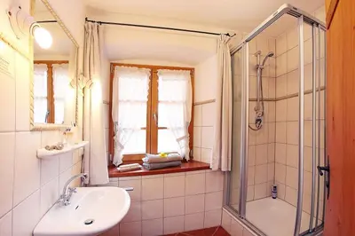 Ein Badezimmer in der Unterkunft Gästehaus Lechner