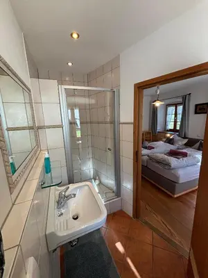 Ein Bett oder Betten in einem Zimmer der Unterkunft Gästehaus Lechner