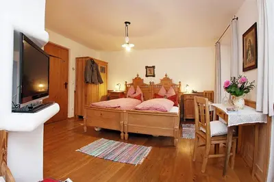 Ein Bett oder Betten in einem Zimmer der Unterkunft Gästehaus Lechner