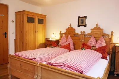 Ein Bett oder Betten in einem Zimmer der Unterkunft Gästehaus Lechner