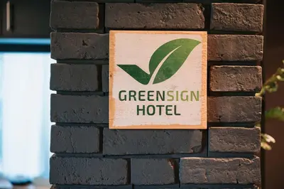 Ein Zertifikat, Auszeichnung, Logo oder anderes Dokument, das in der Unterkunft Coffee Fellows Hotel Puchheim ausgestellt ist