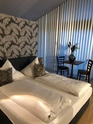 Ein Bett oder Betten in einem Zimmer der Unterkunft Residence