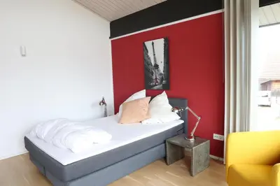 Ein Bett oder Betten in einem Zimmer der Unterkunft Residence