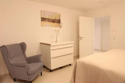 Ein Bett oder Betten in einem Zimmer der Unterkunft Residence