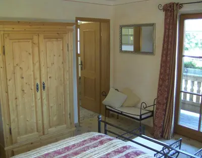 Ein Bett oder Betten in einem Zimmer der Unterkunft Gästehaus Baier am Bad