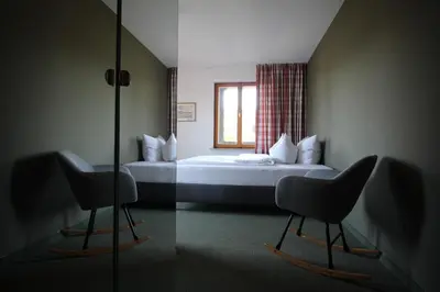 Ein Bett oder Betten in einem Zimmer der Unterkunft Hotel Askania 1927