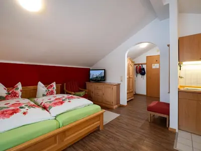 Ein Bett oder Betten in einem Zimmer der Unterkunft Wellness Ferienwohnung mit Hallenbad und Sauna
