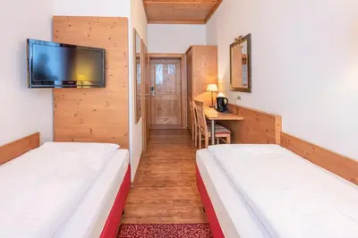 Ein Bett oder Betten in einem Zimmer der Unterkunft Hotel Eder