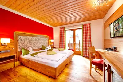 Ein Bett oder Betten in einem Zimmer der Unterkunft Hotel am Wiesenhang - Garni