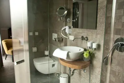 Ein Badezimmer in der Unterkunft Hotel Am Moosrain Garni