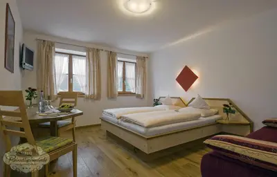 Ein Bett oder Betten in einem Zimmer der Unterkunft Landgasthof - Hotel Reindlschmiede