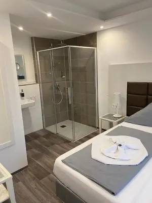 Ein Badezimmer in der Unterkunft Hotel Leitner