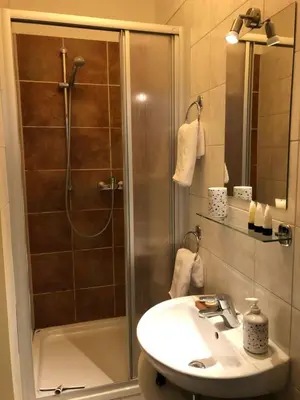 Ein Badezimmer in der Unterkunft Ferienwohnung Zum Fiaker