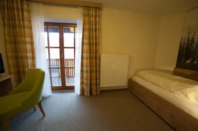 Ein Bett oder Betten in einem Zimmer der Unterkunft Gasthof Bogenrieder