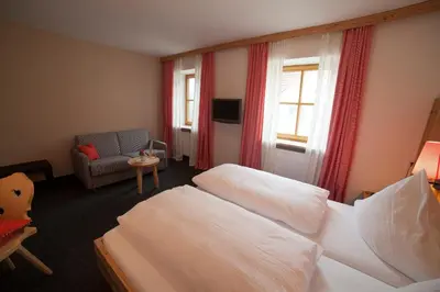 Ein Bett oder Betten in einem Zimmer der Unterkunft Gasthof Bogenrieder