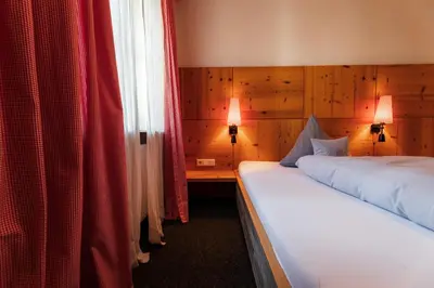 Ein Bett oder Betten in einem Zimmer der Unterkunft Gasthof Bogenrieder
