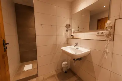 Ein Badezimmer in der Unterkunft Gasthof Bogenrieder