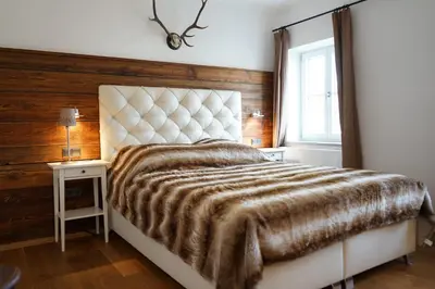 Ein Bett oder Betten in einem Zimmer der Unterkunft Mara Restaurant & Hotel