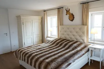 Ein Bett oder Betten in einem Zimmer der Unterkunft Mara Restaurant & Hotel