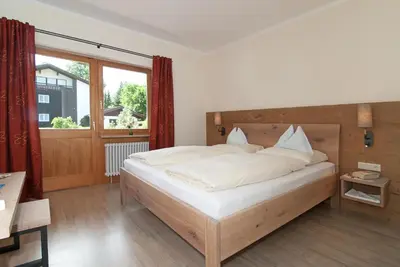 Ein Bett oder Betten in einem Zimmer der Unterkunft Ferienwohnungen Trinkl