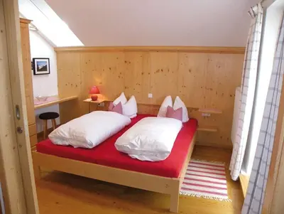 Ein Bett oder Betten in einem Zimmer der Unterkunft Landgasthof Fischbach
