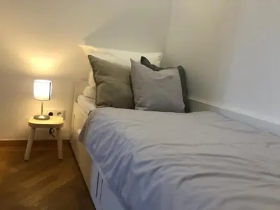 Ein Bett oder Betten in einem Zimmer der Unterkunft Kaiser Ludwig´s wundervolle Ferienwohnung