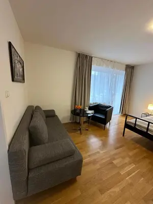 Ein Sitzbereich in der Unterkunft Hotel-Pension Asta