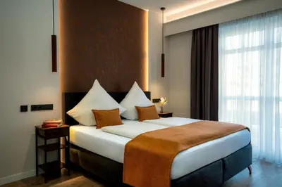Ein Bett oder Betten in einem Zimmer der Unterkunft Alte Postvilla