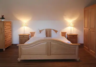 Ein Bett oder Betten in einem Zimmer der Unterkunft Sporerhof