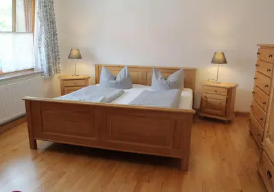 Ein Bett oder Betten in einem Zimmer der Unterkunft Sporerhof