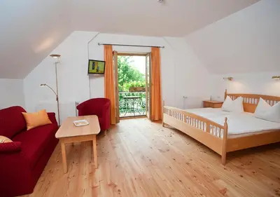 Ein Bett oder Betten in einem Zimmer der Unterkunft Sporerhof