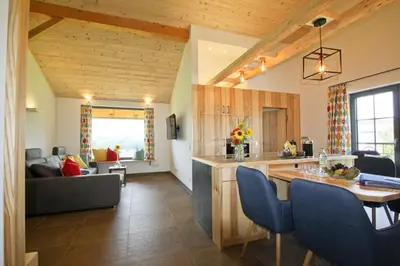 Ein Sitzbereich in der Unterkunft Ferienwohnung Atteltal