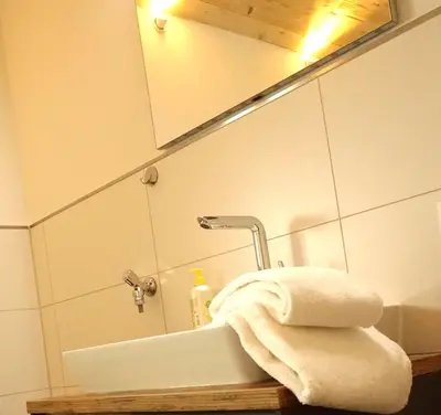 Ein Badezimmer in der Unterkunft Ferienwohnung Atteltal