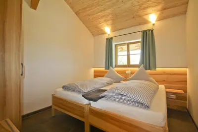 Ein Bett oder Betten in einem Zimmer der Unterkunft Ferienwohnung Atteltal