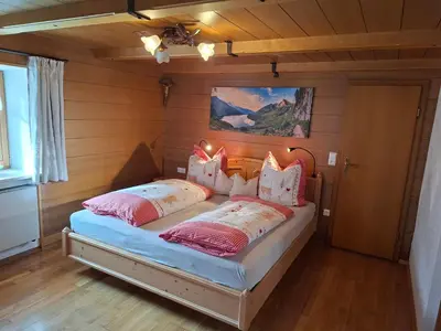 Ein Bett oder Betten in einem Zimmer der Unterkunft Ferienwohnung Faschinggut