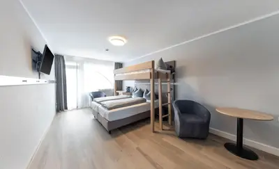 Ein Bett oder Betten in einem Zimmer der Unterkunft centerroom München City