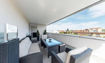 Ein Balkon oder eine Terrasse in der Unterkunft centerroom München City