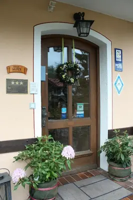 Eine Fassade oder ein Eingang zu Hotel Garni Otto Huber