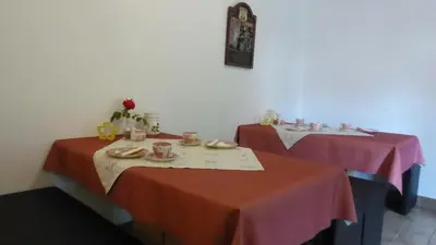 Ein Restaurant oder anderes Speiselokal in der Unterkunft Haus Rosmarin
