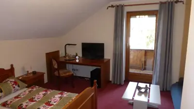 Ein Bett oder Betten in einem Zimmer der Unterkunft Haus Rosmarin